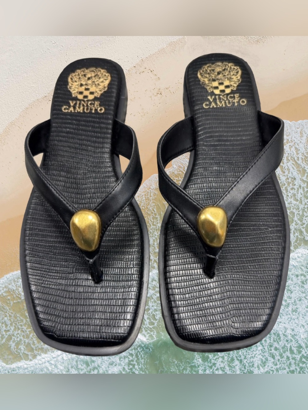Vince Camuto black thong sandals.